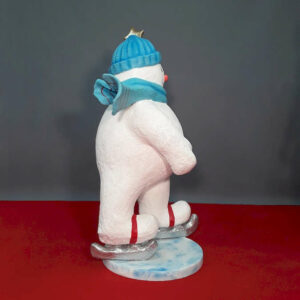 bonhomme-de-neige-a-patins-bonnet-bleu-en-resine-4